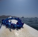 Community gathers for Paddle Out to honor and remember AST1 Phoenix Hanna