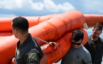 SERE specialists make waves with water survival training