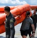 SERE specialists make waves with water survival training