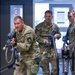 A U.S. CIOR MILCIMP team tactically moves through a doorway