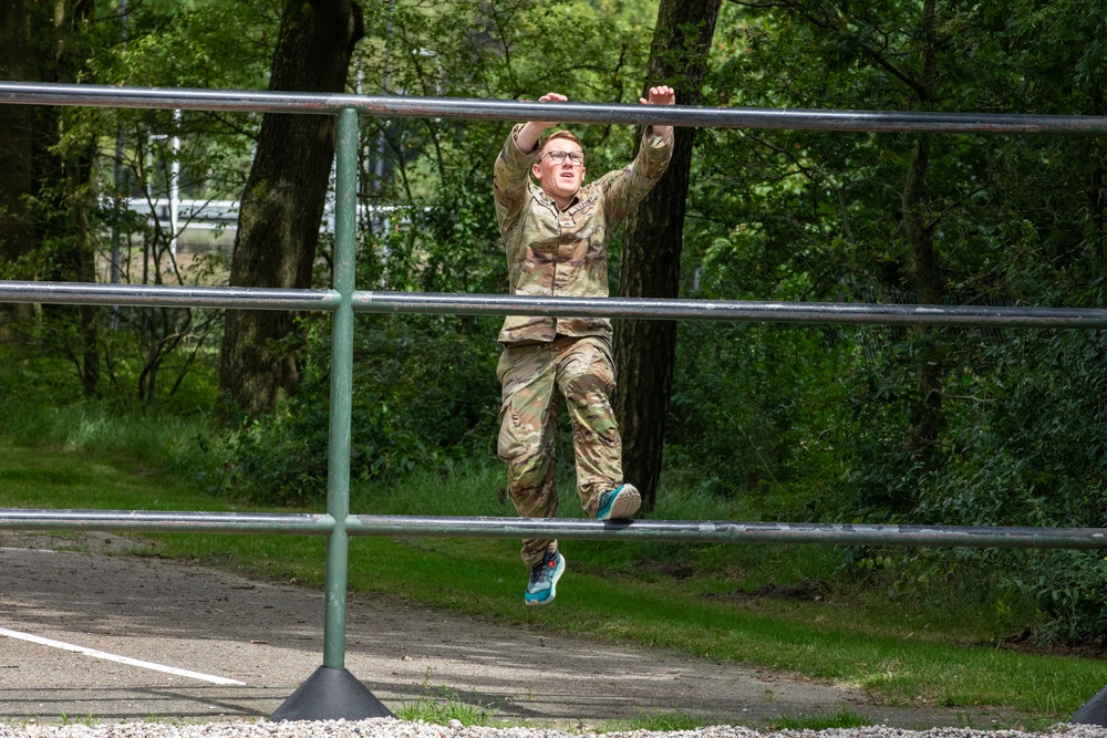 Sgt. Thomas Hunt jumps to an obstacle