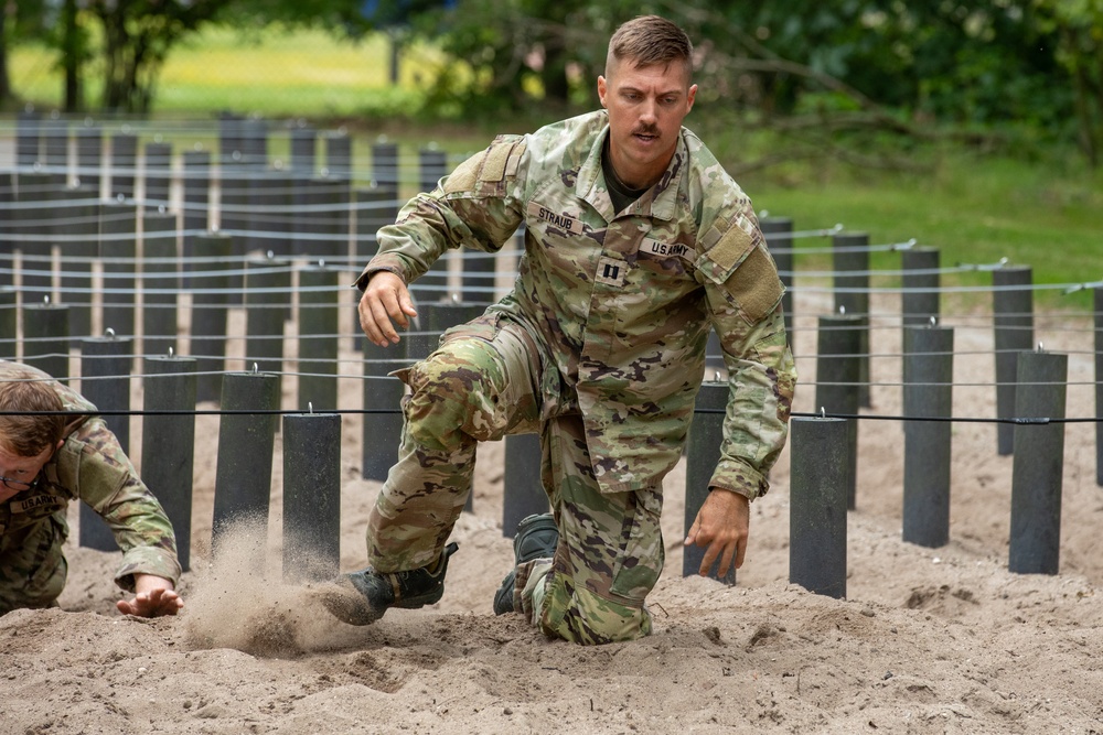 Capt. Jack Straub completes low crawl obstacle