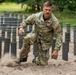 Capt. Jack Straub completes low crawl obstacle