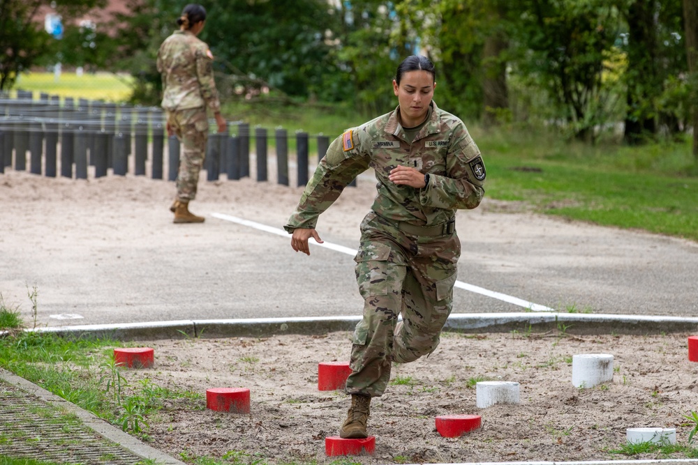 1st Lt. Brianna Mirmina jumps from post to post