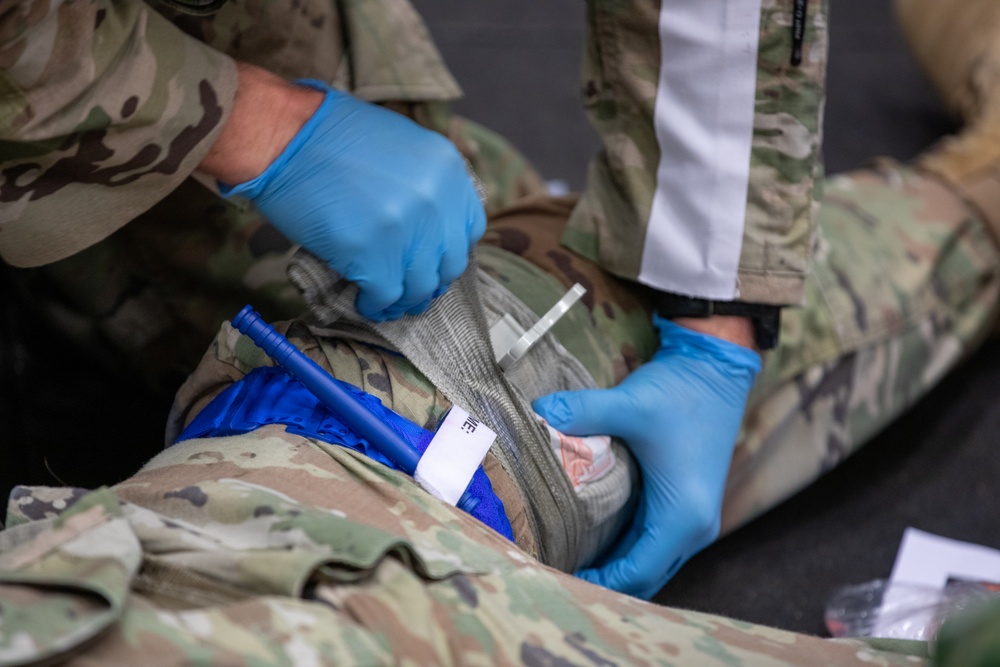 A Soldier conducts Tactical Combat Casualty Care