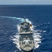 Multinational ships sail in formation during RIMPAC 2024