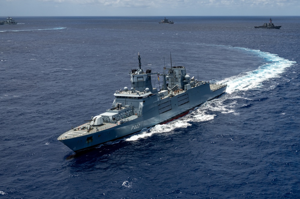Multinational ships sail in formation during RIMPAC 2024