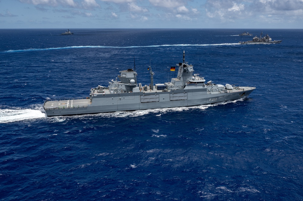 Multinational ships sail in formation during RIMPAC 2024