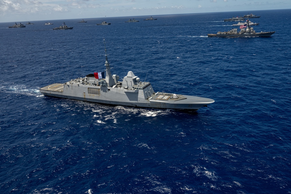 Multinational ships sail in formation during RIMPAC 2024