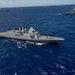 Multinational ships sail in formation during RIMPAC 2024