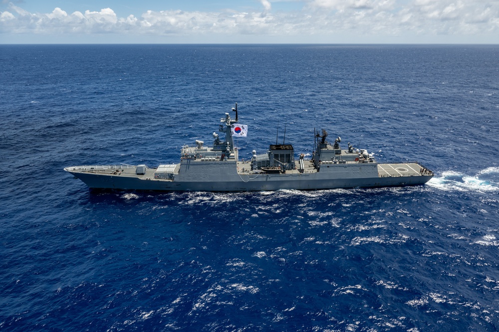Multinational ships sail in formation during RIMPAC 2024