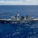 Multinational ships sail in formation during RIMPAC 2024