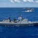 Multinational ships sail in formation during RIMPAC 2024