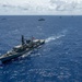 Multinational ships sail in formation during RIMPAC 2024