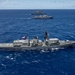 Multinational ships sail in formation during RIMPAC 2024