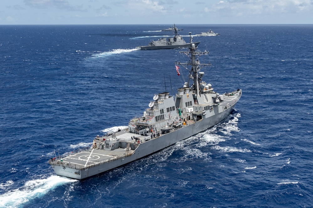Multinational ships sail in formation during RIMPAC 2024