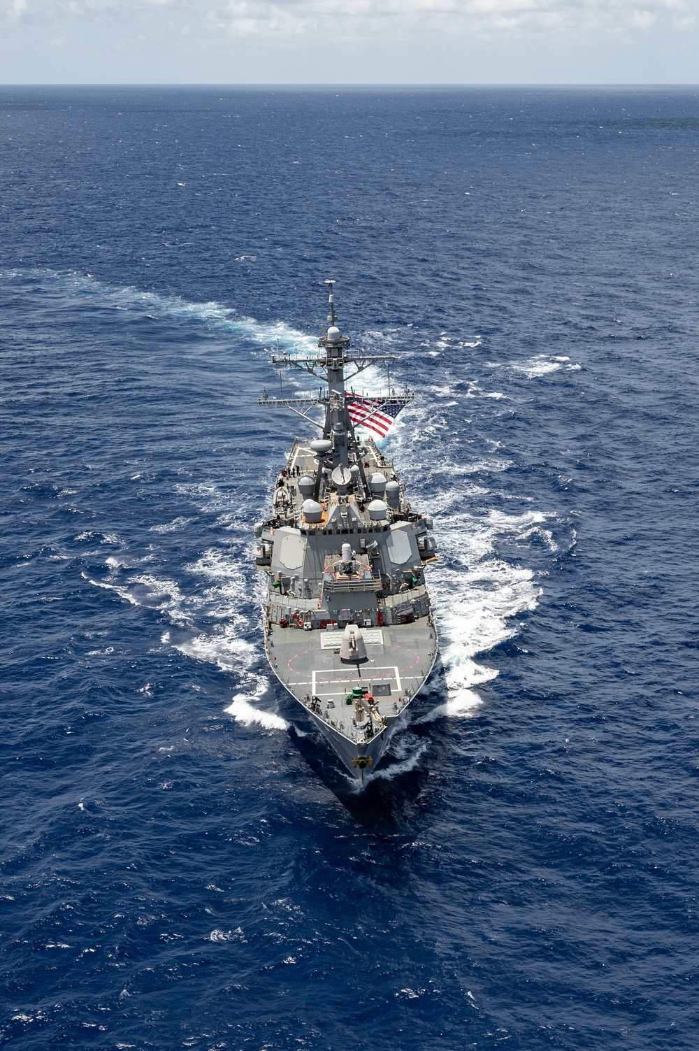 Multinational ships sail in formation during RIMPAC 2024