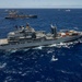 Multinational ships sail in formation during RIMPAC 2024