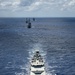 Multinational ships sail in formation during RIMPAC 2024