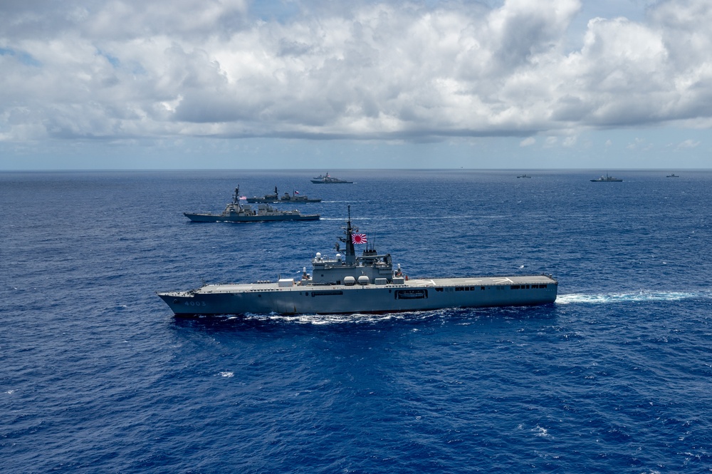 Multinational ships sail in formation during RIMPAC 2024