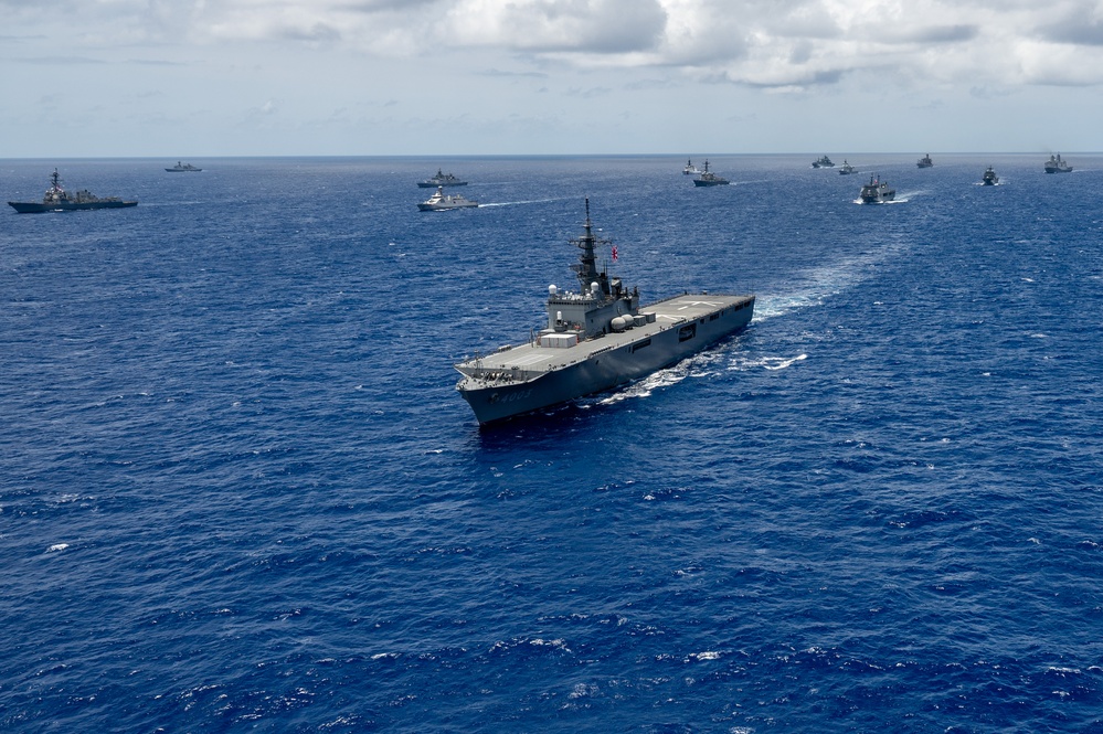 Multinational ships sail in formation during RIMPAC 2024