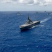 Multinational ships sail in formation during RIMPAC 2024