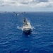 Multinational ships sail in formation during RIMPAC 2024