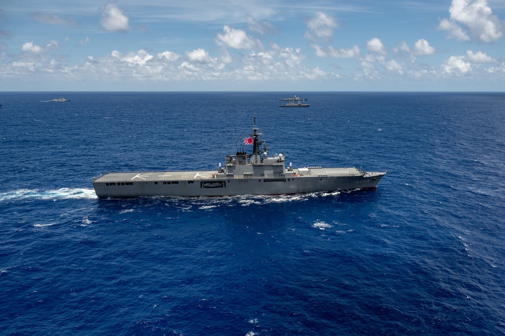 Multinational ships sail in formation during RIMPAC 2024