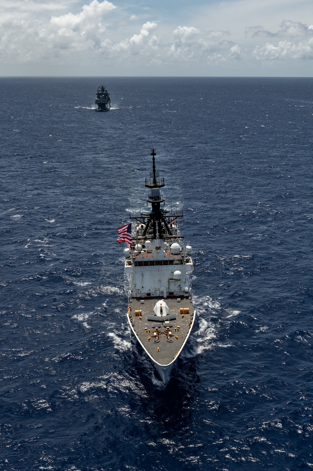 Multinational ships sail in formation during RIMPAC 2024