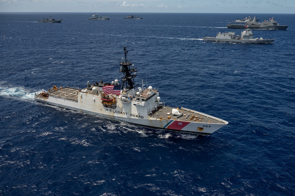 Multinational ships sail in formation during RIMPAC 2024