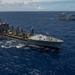 Multinational ships sail in formation during RIMPAC 2024