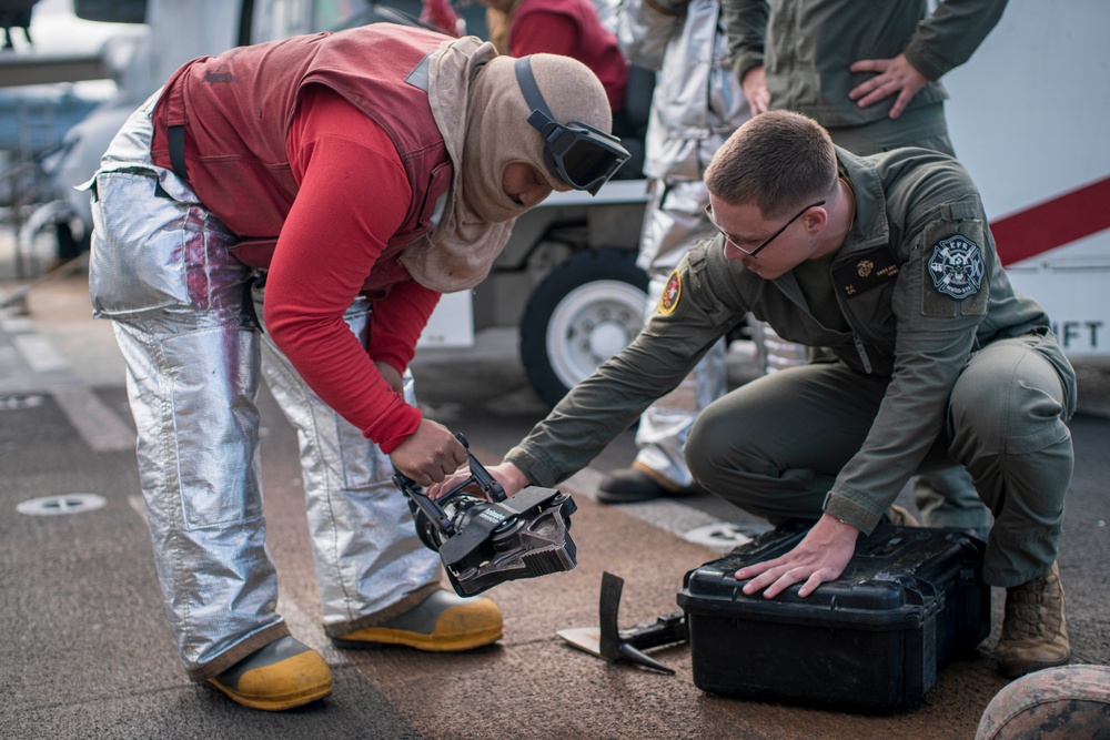 Sharing Knowledge: 15th MEU, USS Boxer Trade Insight on Firefighting Equipment