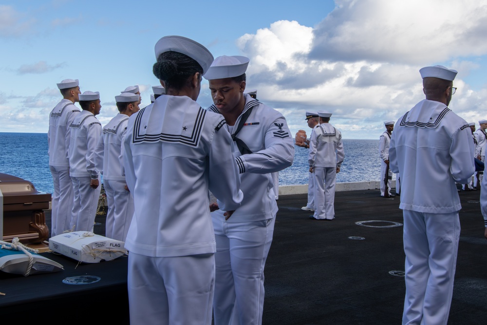 Abraham Lincoln holds a burial-at-sea ceremony