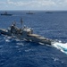 Multinational ships sail in formation during RIMPAC 2024