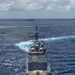 Multinational ships sail in formation during RIMPAC 2024