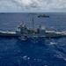 Multinational ships sail in formation during RIMPAC 2024