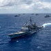 Multinational ships sail in formation during RIMPAC 2024