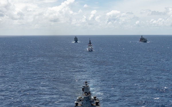 Multinational ships sail in formation during RIMPAC 2024