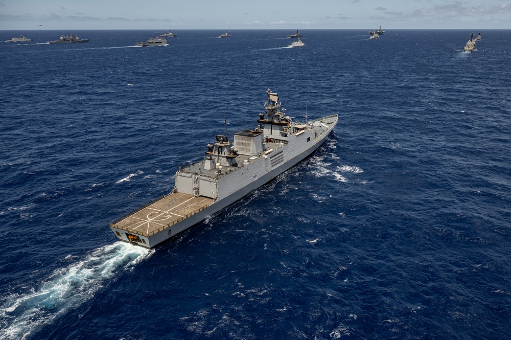 Multinational ships sail in formation during RIMPAC 2024
