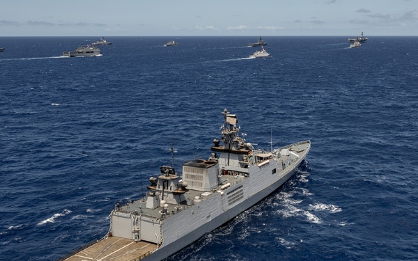 Multinational ships sail in formation during RIMPAC 2024