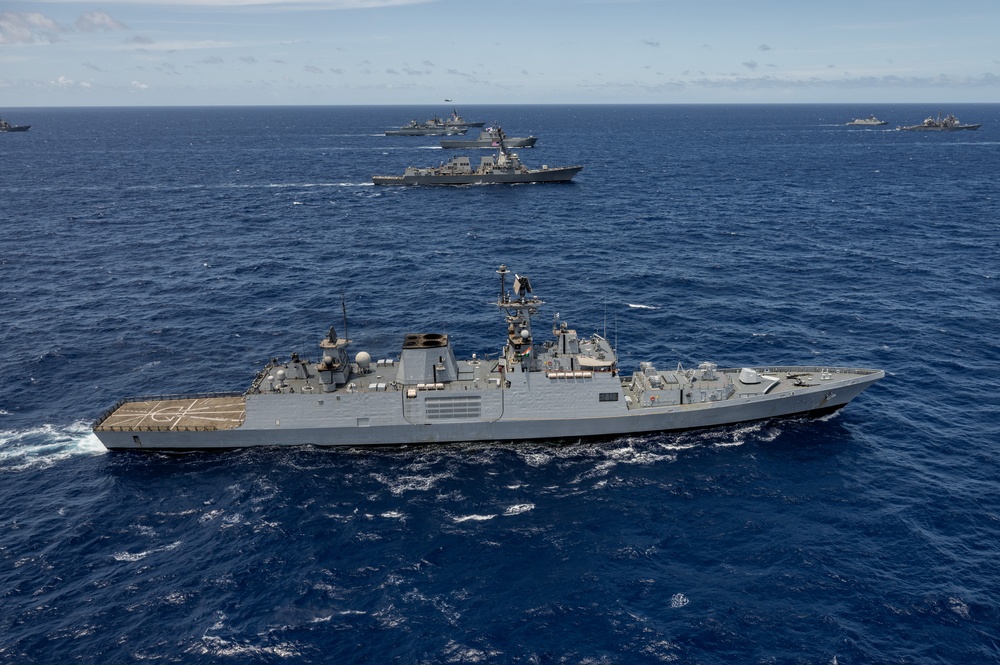Multinational ships sail in formation during RIMPAC 2024
