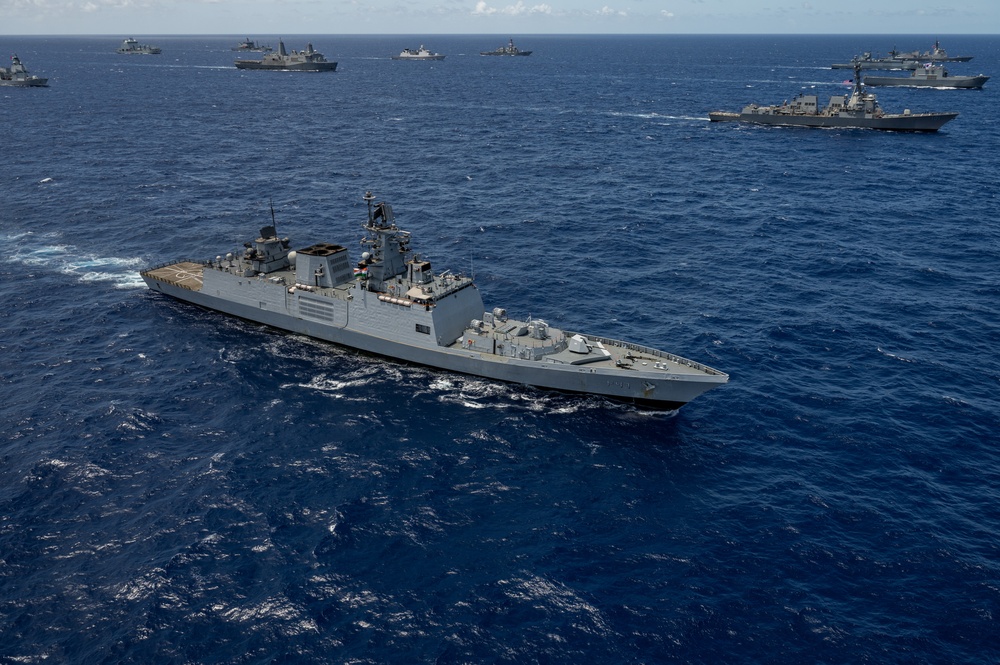 Multinational ships sail in formation during RIMPAC 2024