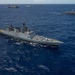 Multinational ships sail in formation during RIMPAC 2024