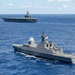Multinational ships sail in formation during RIMPAC 2024
