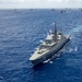 Multinational ships sail in formation during RIMPAC 2024