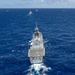 Multinational ships sail in formation during RIMPAC 2024