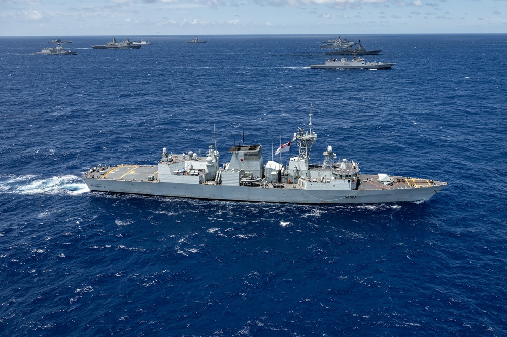 Multinational ships sail in formation during RIMPAC 2024