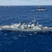 Multinational ships sail in formation during RIMPAC 2024