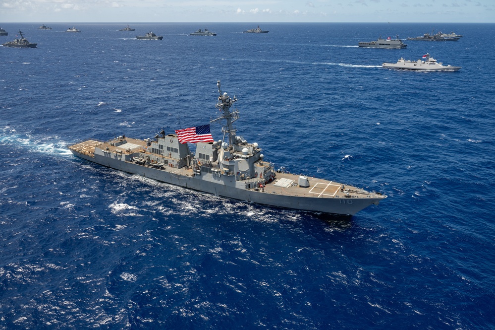 Multinational ships sail in formation during RIMPAC 2024
