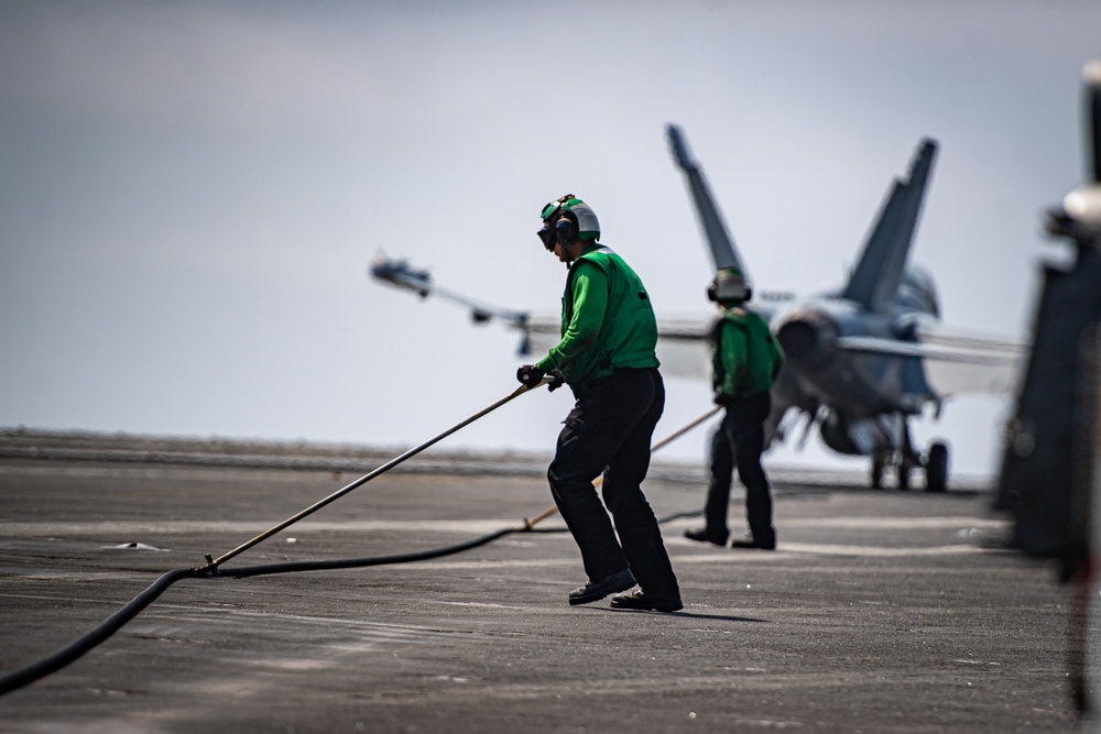 Nimitz Sailors Guide An Arresting Wire